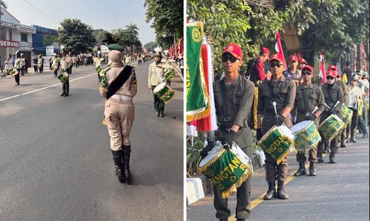 POLBANGTAN BOGOR: Direktur Yoyon Haryanto apresiasi penampilan Drumband Canka Lembayung Muda membawakan sejumlah untuk memeriahkan suasana kirab, mulai dari lagu-lagu nasional seperti 
